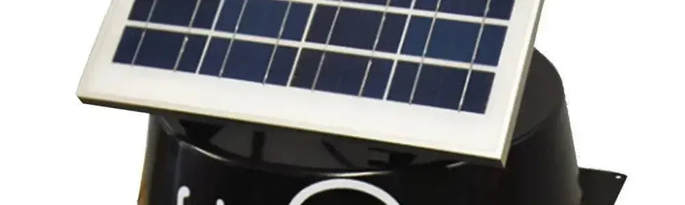 Rectangular solar panel mounted on a black circular roof ventilation unit against a plain white background