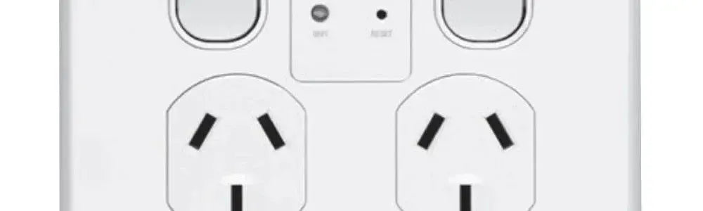 White double powerpoint with a glossy finish, featuring two switches and a central reset button for flush wall mounting