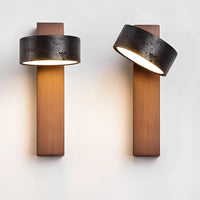 Loom Traventing Adjustable Stone Wall Light in Black