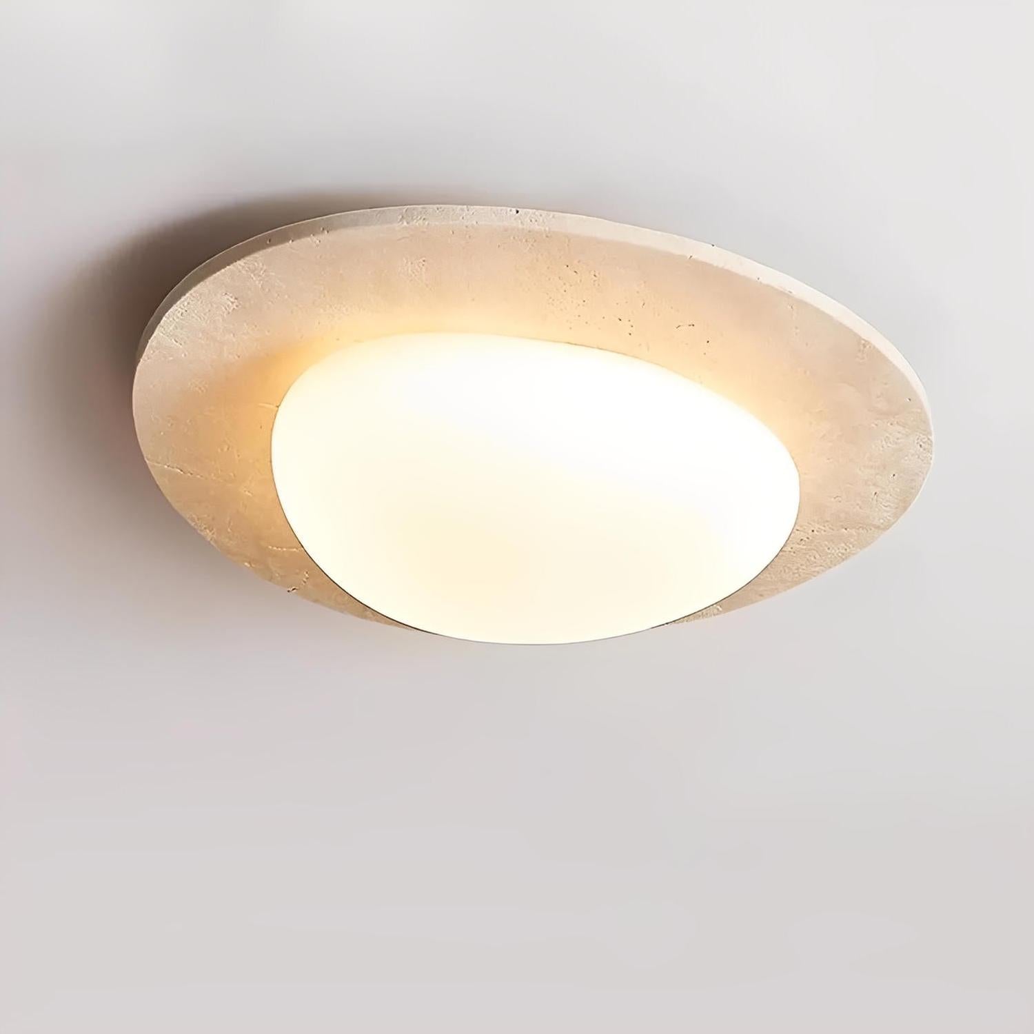 ORE Thalos travertine stone oyster light, natural stone finish for designer interiors