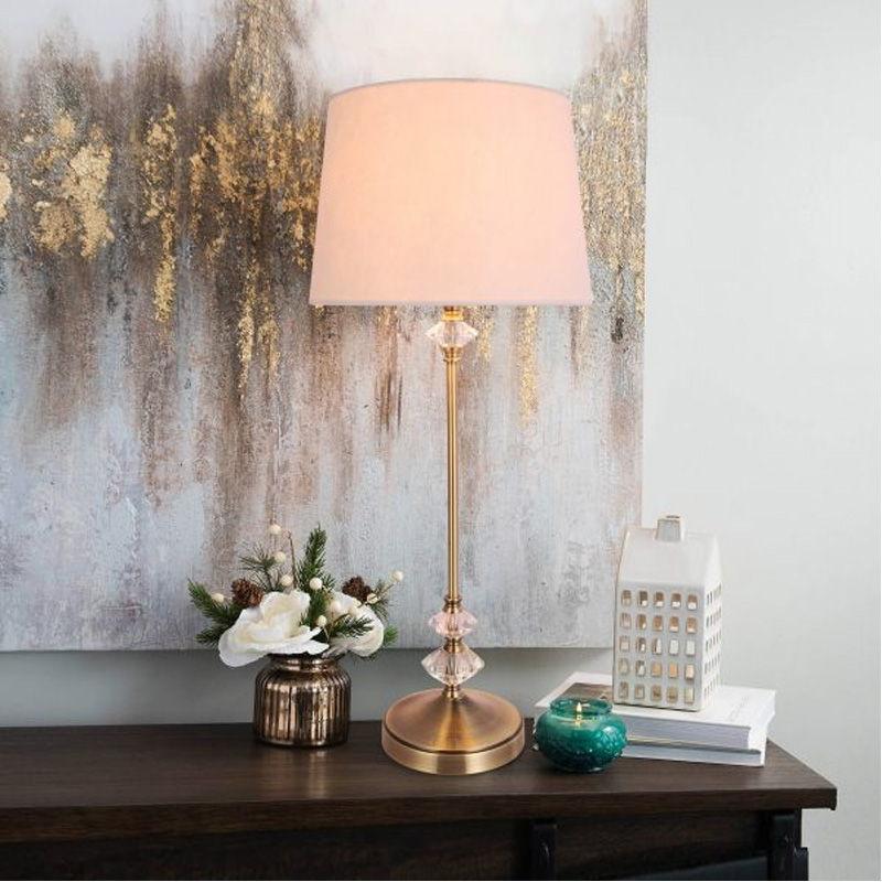 https://thelightingoutlet.com.au/cdn/shop/products/Ringo-Crystal-Table-Lamp-1Lt-in-Antique-Brass-with-White-Shade-Table-Lamp-Lexi-Lighting-LL-27-0048.jpg?v=1635444082